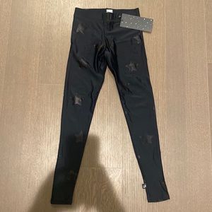 NWT Terri kids star shiny leggings size medium